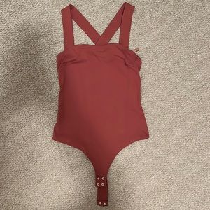 Mauve body suit from dynamite